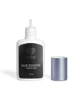 Bottle of 'Lovely' glue booster with a black label on a white background