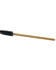 One gold-colored brushes with bristle heads on a white background