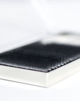 Close-up of Ideal lash extension strips showing premium quality fiber and organized length arrangement