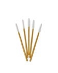 Five gold-colored brushes with bristle heads on a white background